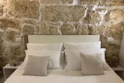 Letto o letti in una camera di La Casa di Marta