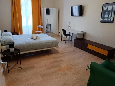 Letto o letti in una camera di Balcone Etnea 2 in Catania centro perfetto per la festa di Sant'Agata