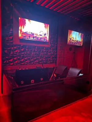 TV o dispositivi per l'intrattenimento presso BLACK HOLE ROOMS
