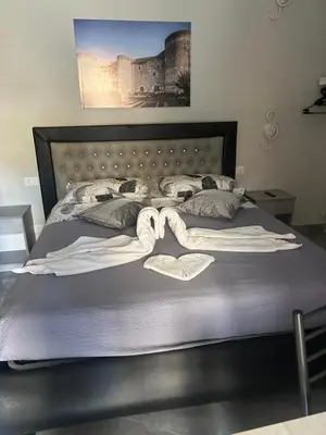 Letto o letti in una camera di Fanale House