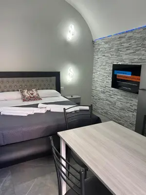 Letto o letti in una camera di Fanale House