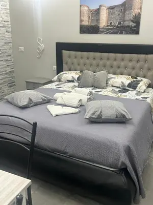 Letto o letti in una camera di Fanale House