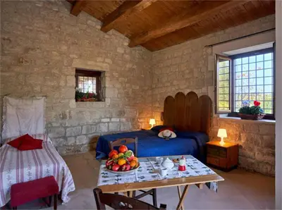 Letto o letti in una camera di Biancolilla Casa Vacanze