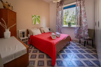 Letto o letti in una camera di Villa Sofia Fronte Mare