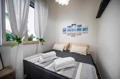 Letto o letti in una camera di Villa Sofia Fronte Mare