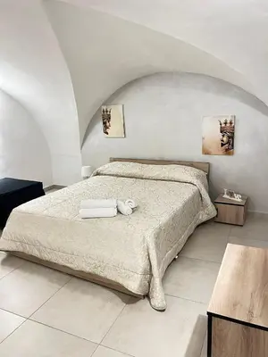 Letto o letti in una camera di Butterfly House