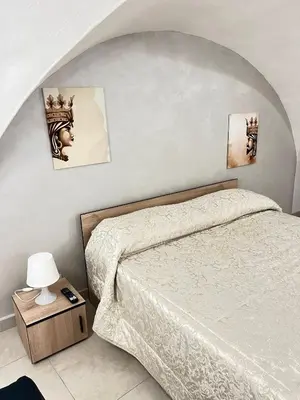 Letto o letti in una camera di Butterfly House
