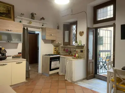 Cucina o angolo cottura di A MARE AMARE - rifugio nel cuore di Ortigia