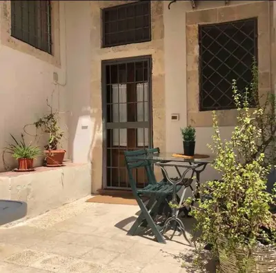 Patio o area all'aperto di A MARE AMARE - rifugio nel cuore di Ortigia