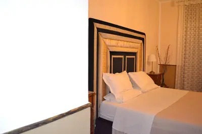 Letto o letti in una camera di Neaiton