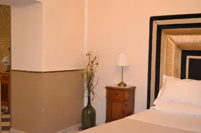 Letto o letti in una camera di Neaiton