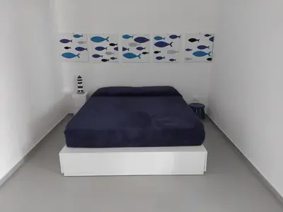 Letto o letti in una camera di Il Campo Blu