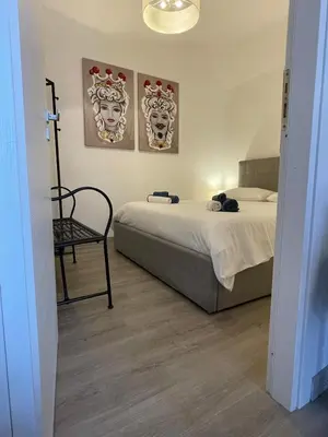 Letto o letti in una camera di Casa Terme della Rotonda