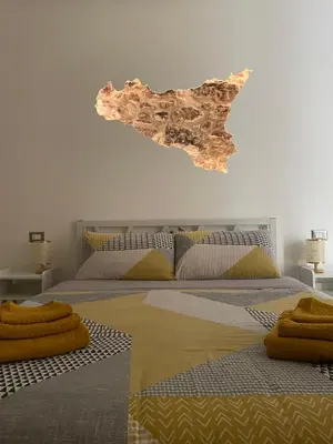 Letto o letti in una camera di I Parienti Ra Zita