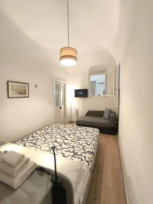 Letto o letti in una camera di BiBiHome Catania appartamento in centro storico