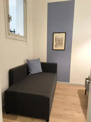 Area soggiorno di BiBiHome Catania appartamento in centro storico