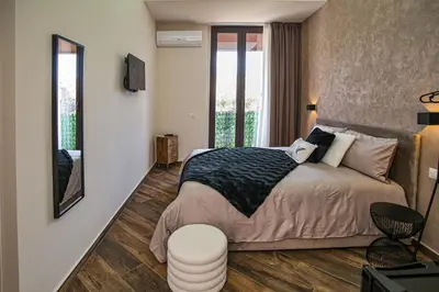 Letto o letti in una camera di Lustru Apartment