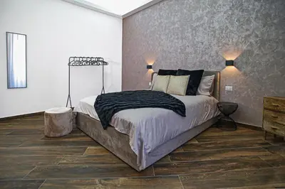 Letto o letti in una camera di Lustru Apartment
