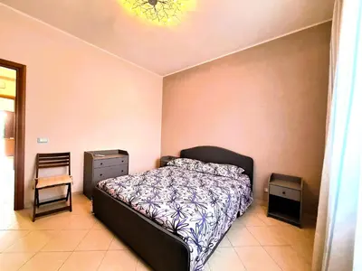 Letto o letti in una camera di Villa del Mandorlo