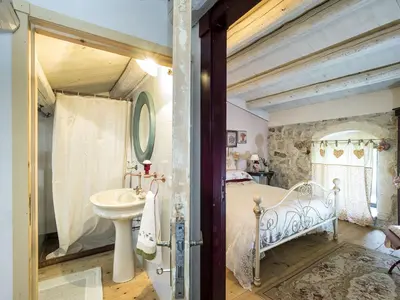 Letto o letti in una camera di Villa Molinum
