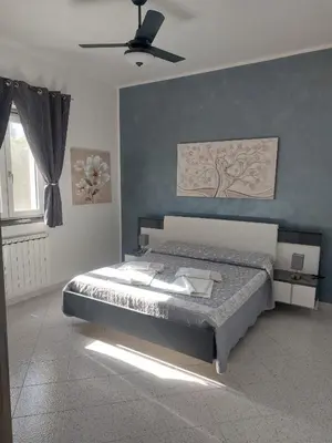 Letto o letti in una camera di Syracuse Blue Sea