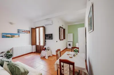 TV o dispositivi per l'intrattenimento presso Green Leaves Apartment