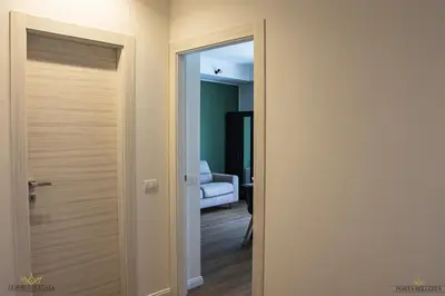 Letto o letti in una camera di Casa Vacanza LE PORTE DI AGATA , Viale San Teodoro Catania