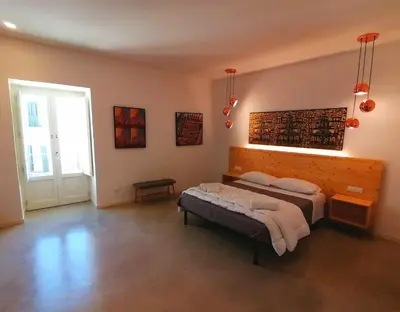 Letto o letti in una camera di B&B Ibla Art Centro
