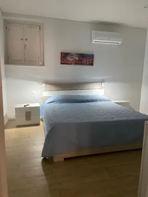 Letto o letti in una camera di Casa Angelino