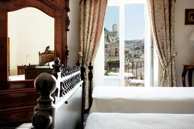 Letto o letti in una camera di Dimora Birullà Luxury apartment