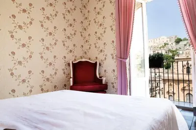 Letto o letti in una camera di Dimora Birullà Luxury apartment
