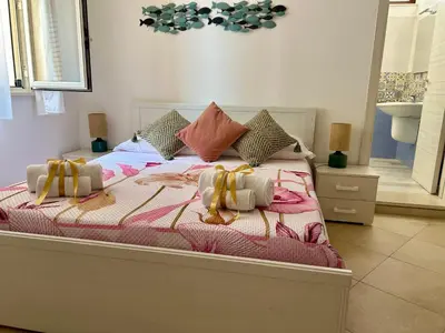 Letto o letti in una camera di Villa G.A.I.A. Pantanello