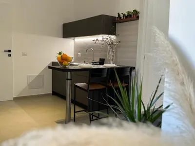 Cucina o angolo cottura di Casa Artemis nel cuore di Ortigia a Siracusa