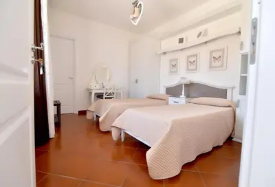 Letto o letti in una camera di B&B Home Sweet Home Rosolini