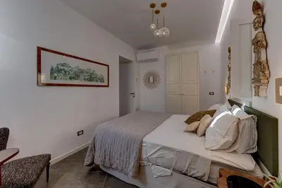 Letto o letti in una camera di Ortigia Green