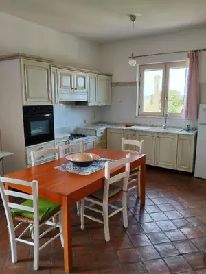 Cucina o angolo cottura di Casa Rosa Isola