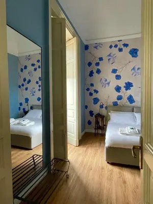 Letto o letti in una camera di Casa Flos31