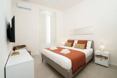 Letto o letti in una camera di Habibi Apartments