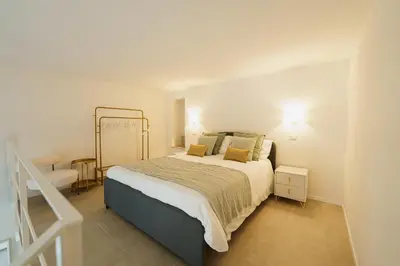 Letto o letti in una camera di Habibi Apartments
