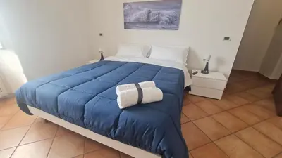 Letto o letti in una camera di Archi di Mare Apartments