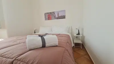 Letto o letti in una camera di Archi di Mare Apartments