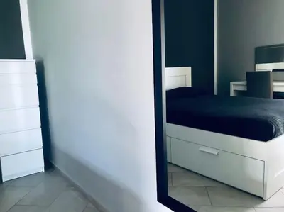 Letto o letti in una camera di Villa con piscina vista mare e Etna