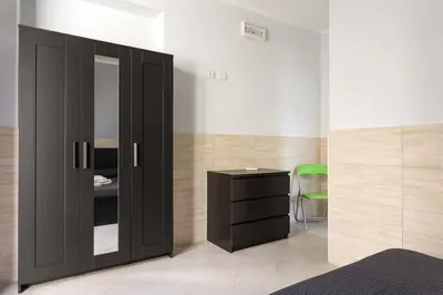 Letto o letti in una camera di Villa con piscina vista mare e Etna