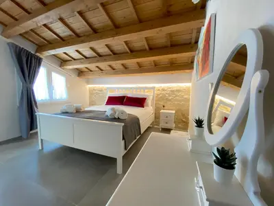 Letto o letti in una camera di Elorino Chic&Relax