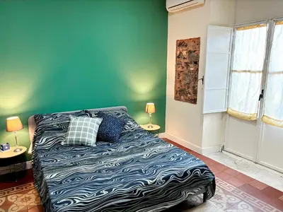 Letto o letti in una camera di Medinat House