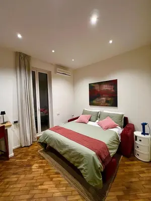 Letto o letti in una camera di Duomo Leonardo31 Dimora di Charme