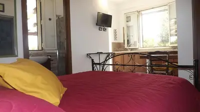 Letto o letti in una camera di BeB Nonno Baffo