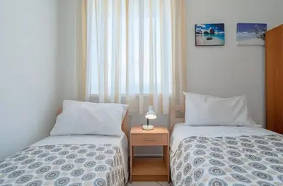 Letto o letti in una camera di Charming House in Fontane Bianche with Private Garden