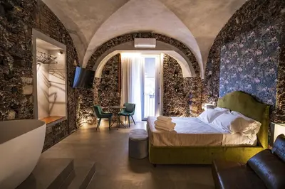 Area soggiorno di CHARME Catania Central Suites