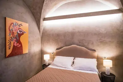 Letto o letti in una camera di CHARME Catania Central Suites